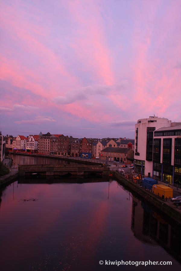 Streaky clouds over Leith during sunrise