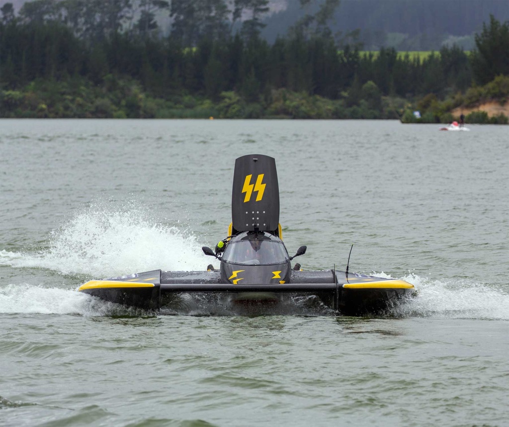 A hydroplane boat returning to dock
